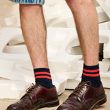 Close-up of Escuyer Men Striped Ankle Socks Ecru / Blue / Orange — retro stripe detail at the cuff