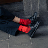 Men wearing Escuyer Purple / Blue Colour Block Socks with black shoes
