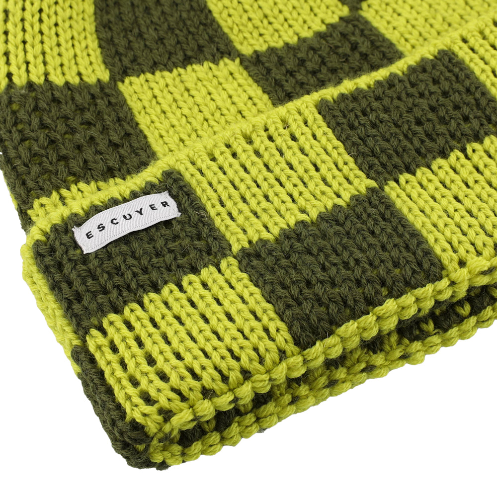 Side view of yellow and khaki checkered knit merino beanie