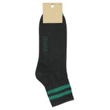 Close-up of Escuyer Men Striped Ankle Socks Off Black / Green — sharp contrast stripe at the cuff