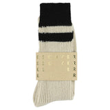 Close-up of Escuyer Ecru / Black striped cashmere socks — 10% cashmere, 38% virgin wool, GRS certified recycled polyamide