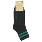 Close-up of Escuyer Women Striped Ankle Socks Off Black / Green — sharp contrast stripe at the cuff
