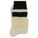 Close-up of Escuyer Ecru / Black women's striped cashmere socks — 10% cashmere, 38% virgin wool, GRS certified recycled polyamide