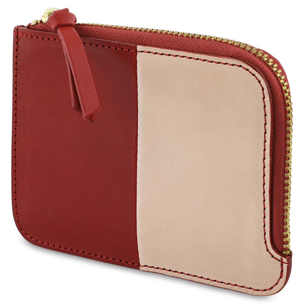 Escuyer pink and red zip wallet open — interior card sleeve and cash compartment