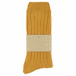 Close-up of Escuyer Mustard cashmere crew socks showing soft knit texture — 10% cashmere, 38% virgin wool, GRS certified recycled polyamide