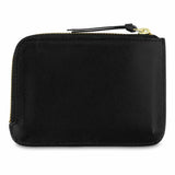 Escuyer black zip wallet open — interior card sleeve and cash compartment