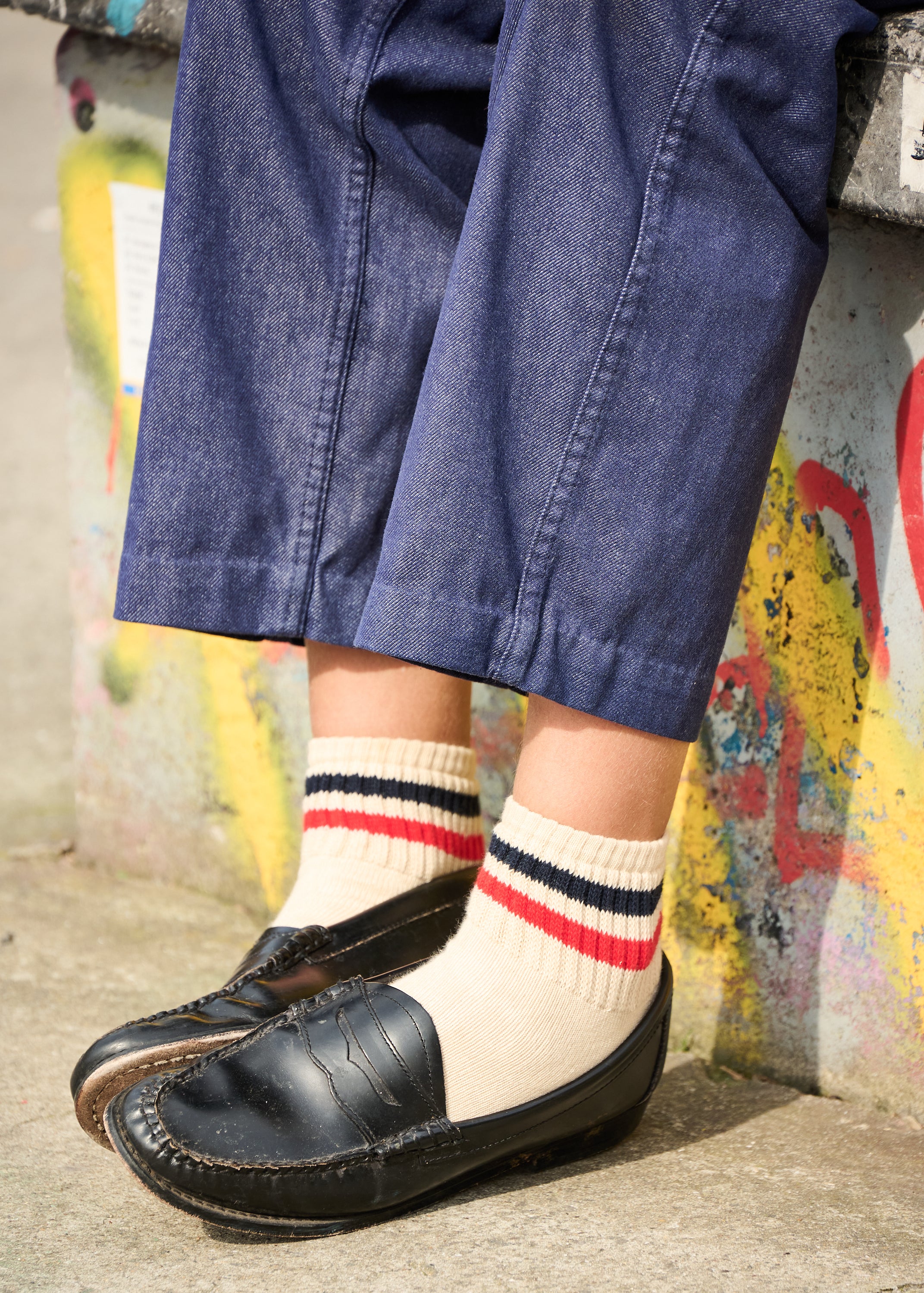 Woman wearing Escuyer striped ankle socks with black loafers — styled for spring summer