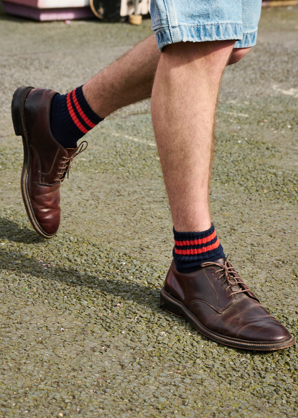 Man wearing Escuyer Men Striped Ankle Socks Bright Blue / Ecru with brown loafers — bold summer style