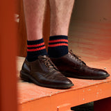 Man wearing Escuyer Men Striped Ankle Socks Khaki / Ecru with brown loafers — versatile everyday style