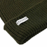 Side view of khaki ribbed merino wool beanie with folded cuff