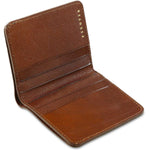 Escuyer light brown slim wallet showing slim profile and hand painted edges