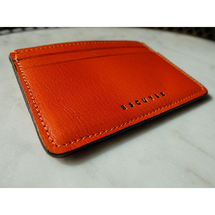 Escuyer handmade leather cardholder in orange — Italian vegetable tanned leather, gold logo